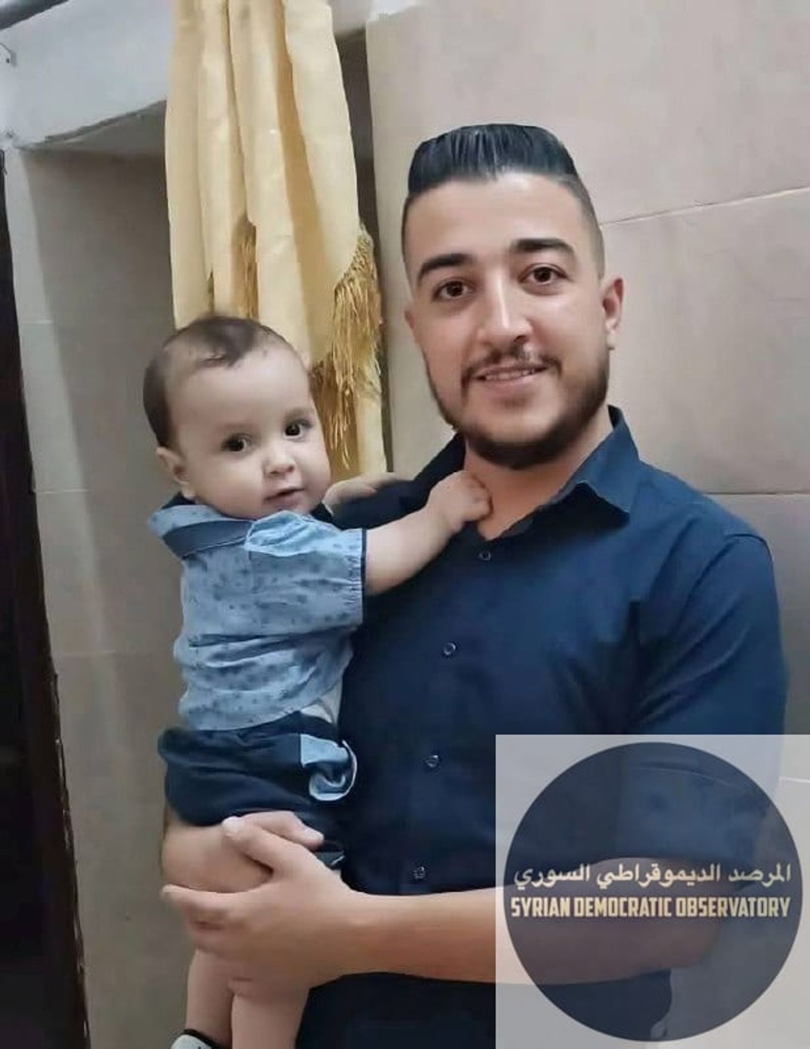 حمص: صورة الشهيد علي الزروفي، و الذي قتل مع والده ازدشير الزروفي (لايظهر في الصورة)، استشهدا مساء اليوم برصاص ميلشيات الأمن العام الإرهابية، وأصيبت زوجته بجروح خطيرة.