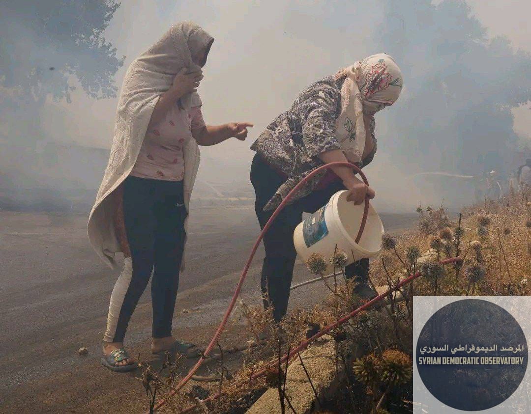 نساء الساحل يقومون بإطفاء الحرائق، و أشباه الرجال من إرهاببي الجولاني يقومون بإشعالها