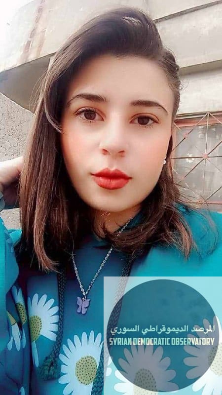 تعابير وجهها كافية لكشف إجرامهم وإرهابهم بحقها وحق أهلها.