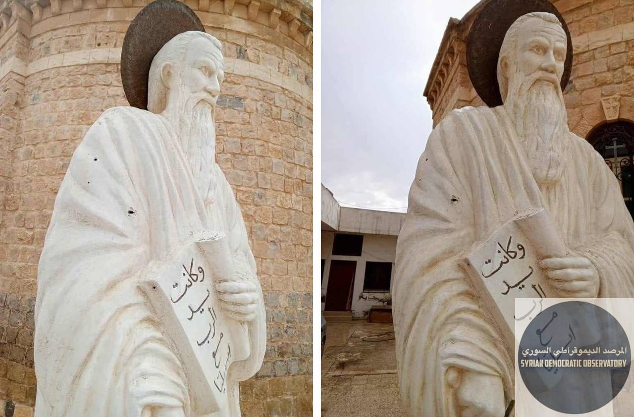 مقاتلين جهاديين يطلقون النار على كنيسة القديس مار الياس الحي، ويصيبون تمثال القديس بعدة رصاصات في مدينة ، محافظة .